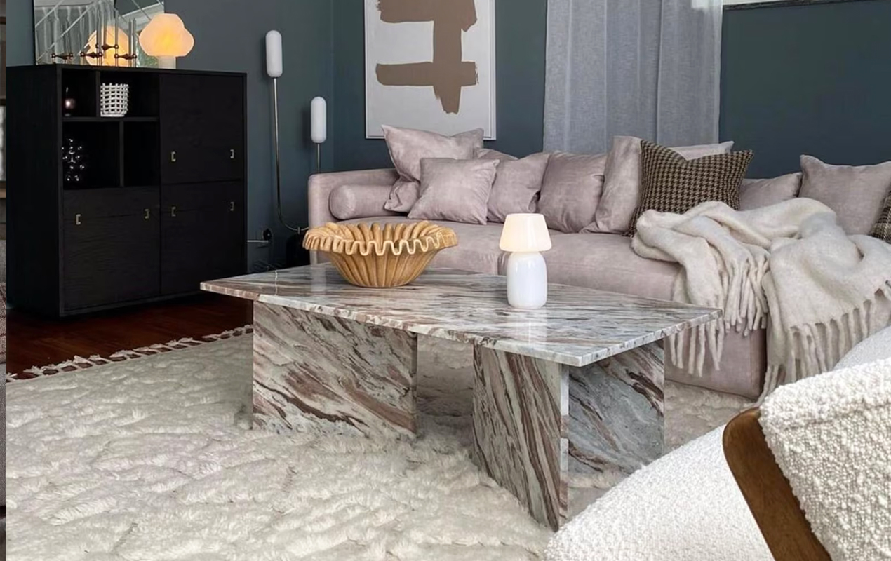 Living room setting with Tri Leg Center Coffee Table