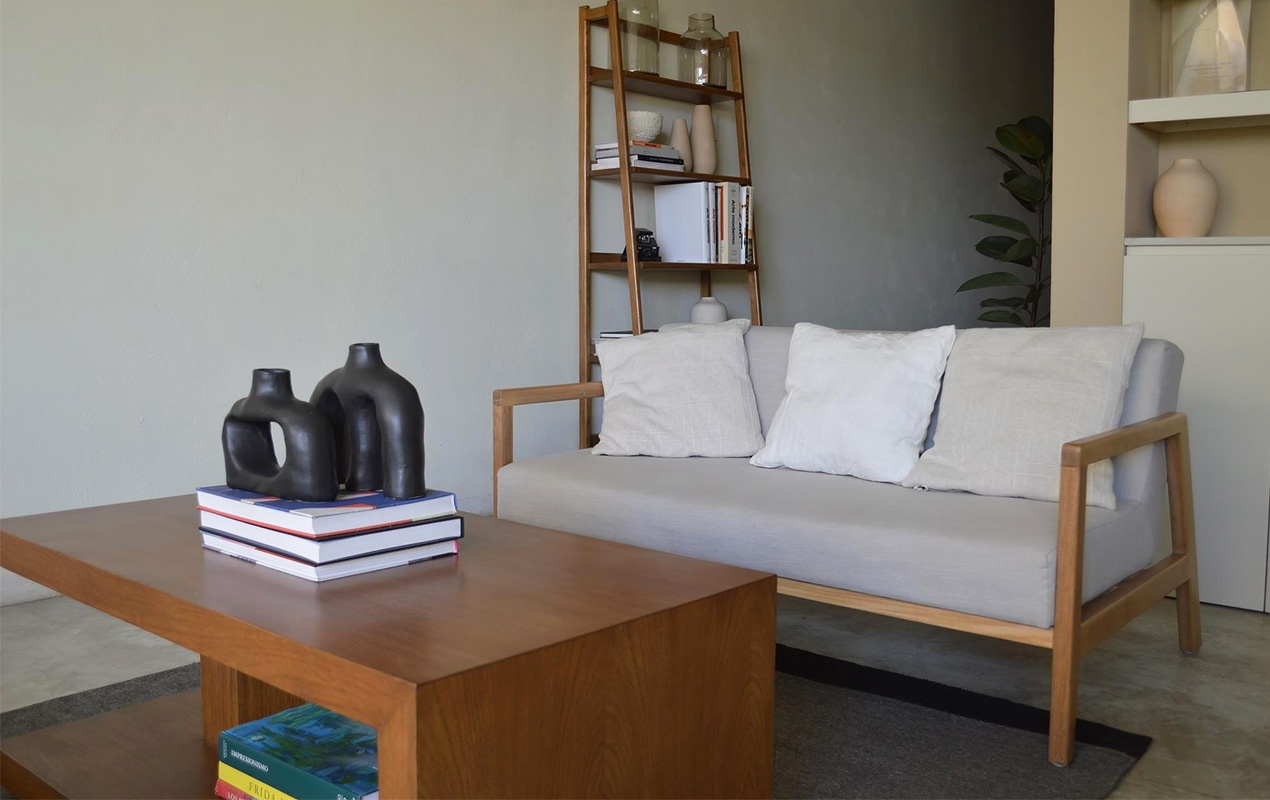 Living room with wood coffee table and gray sofa