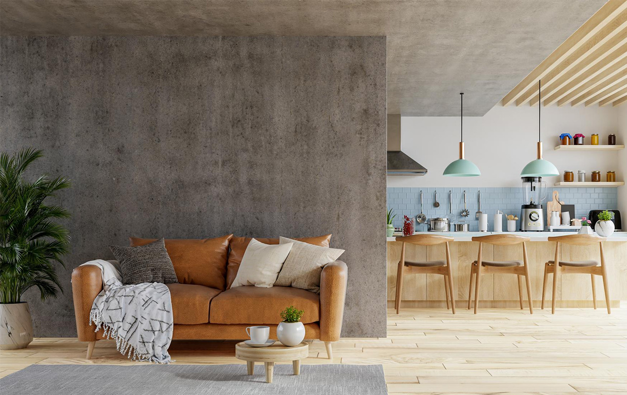 Living interior with concrete wall mock up warm tones with leather sofa