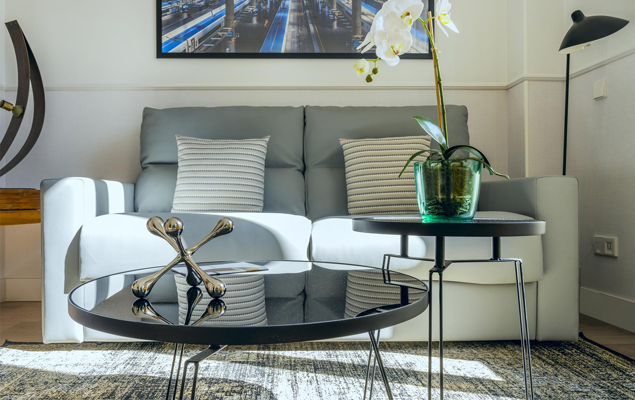 Living room with black glass side table