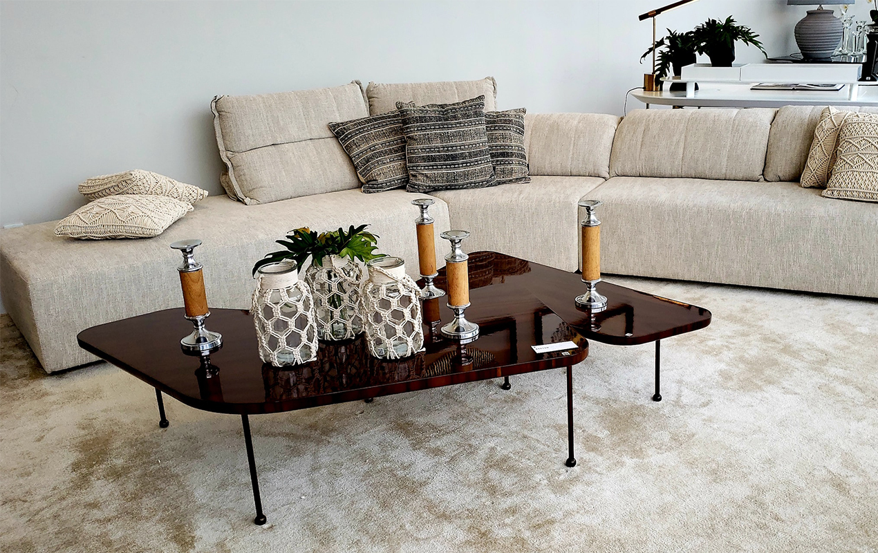 Living room with cream sofa and brown coffee table