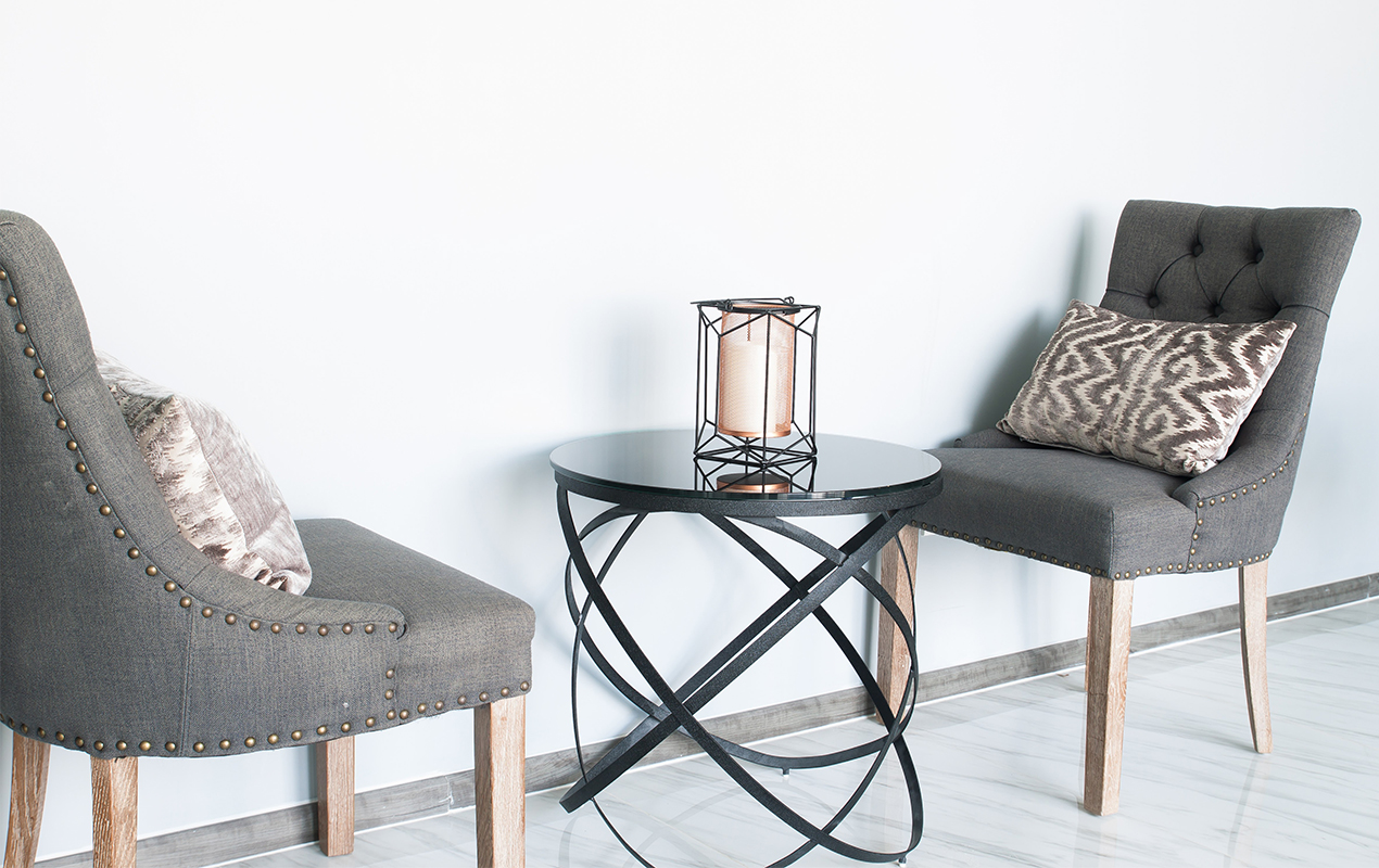 Seating area with abstract small coffee tables