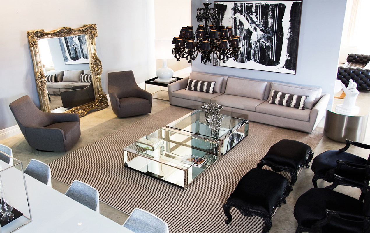 Luxe living room with large glass coffee table