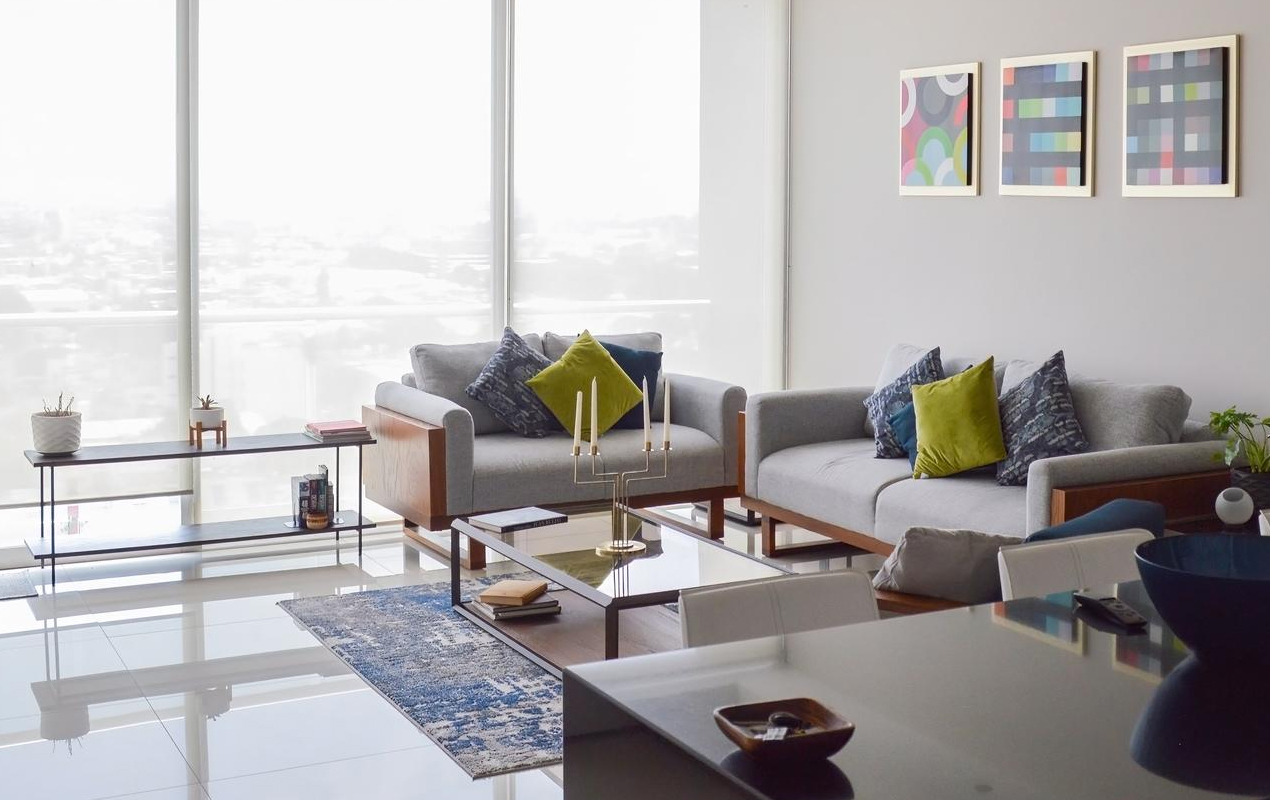 Cozy living room with sofa coffee table dired flowers