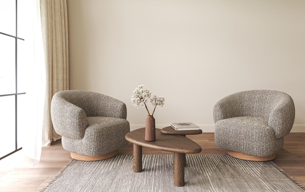 Interior with Scandinavian boho style armchairs with coffee table vase book