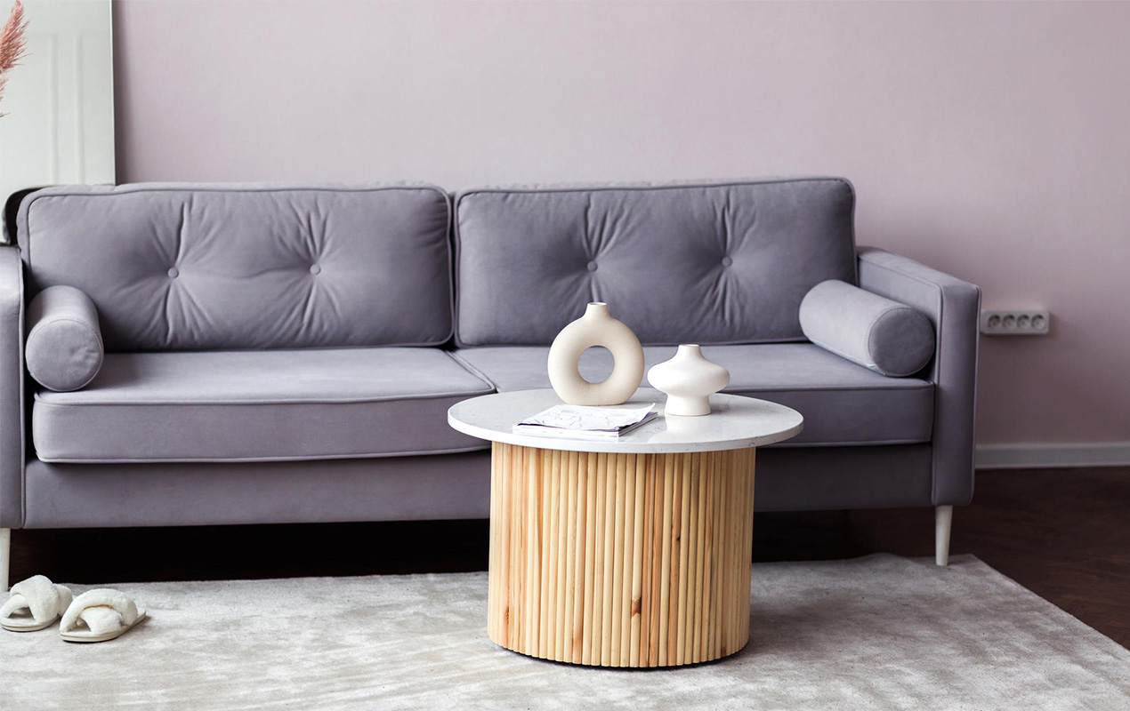 Modern living room interior purple sofa round table gray carpet