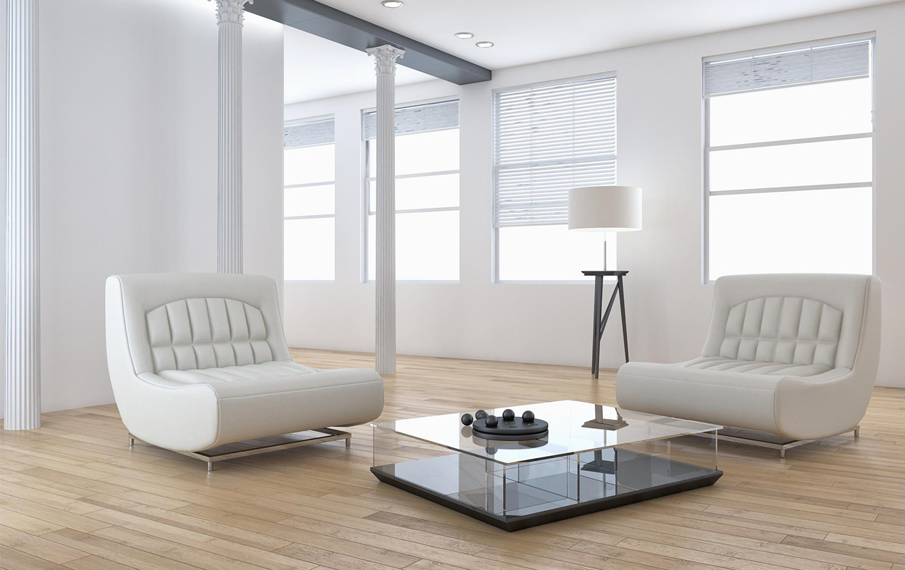 Minimal interior with white sofas and coffee table