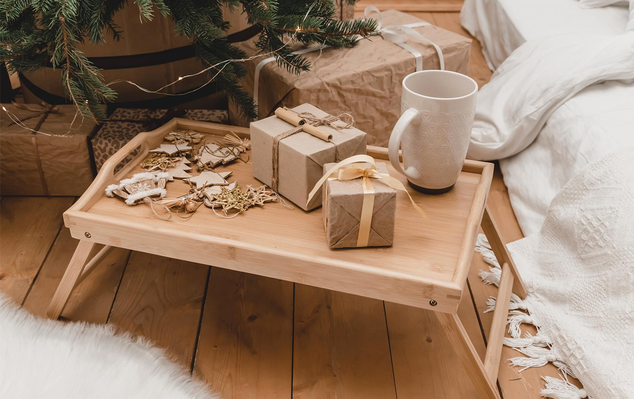 Farmhouse interior with breakfast coffee table and presents