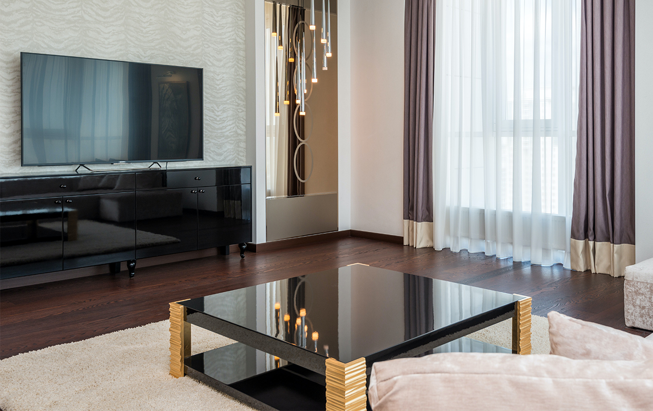 Luxury home interior with black gloss coffee table