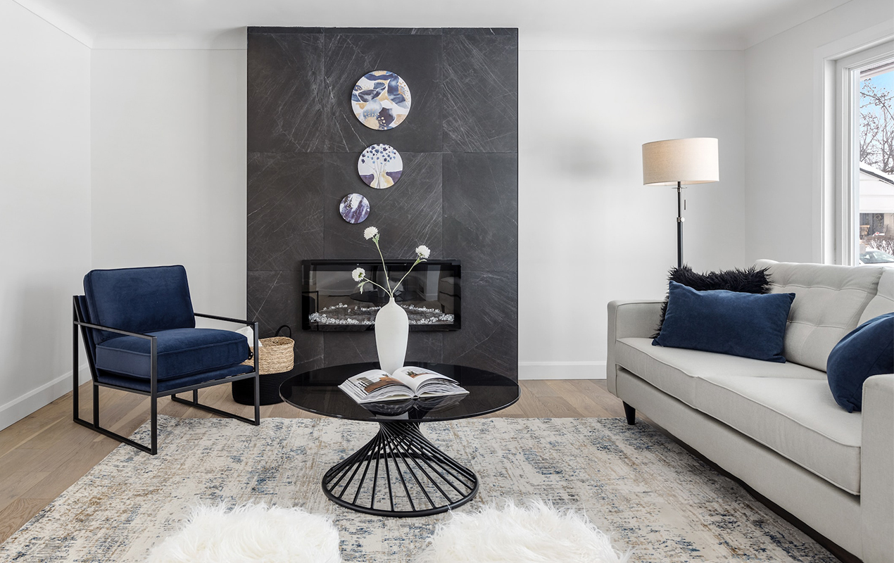 Living area with black spiral coffee table