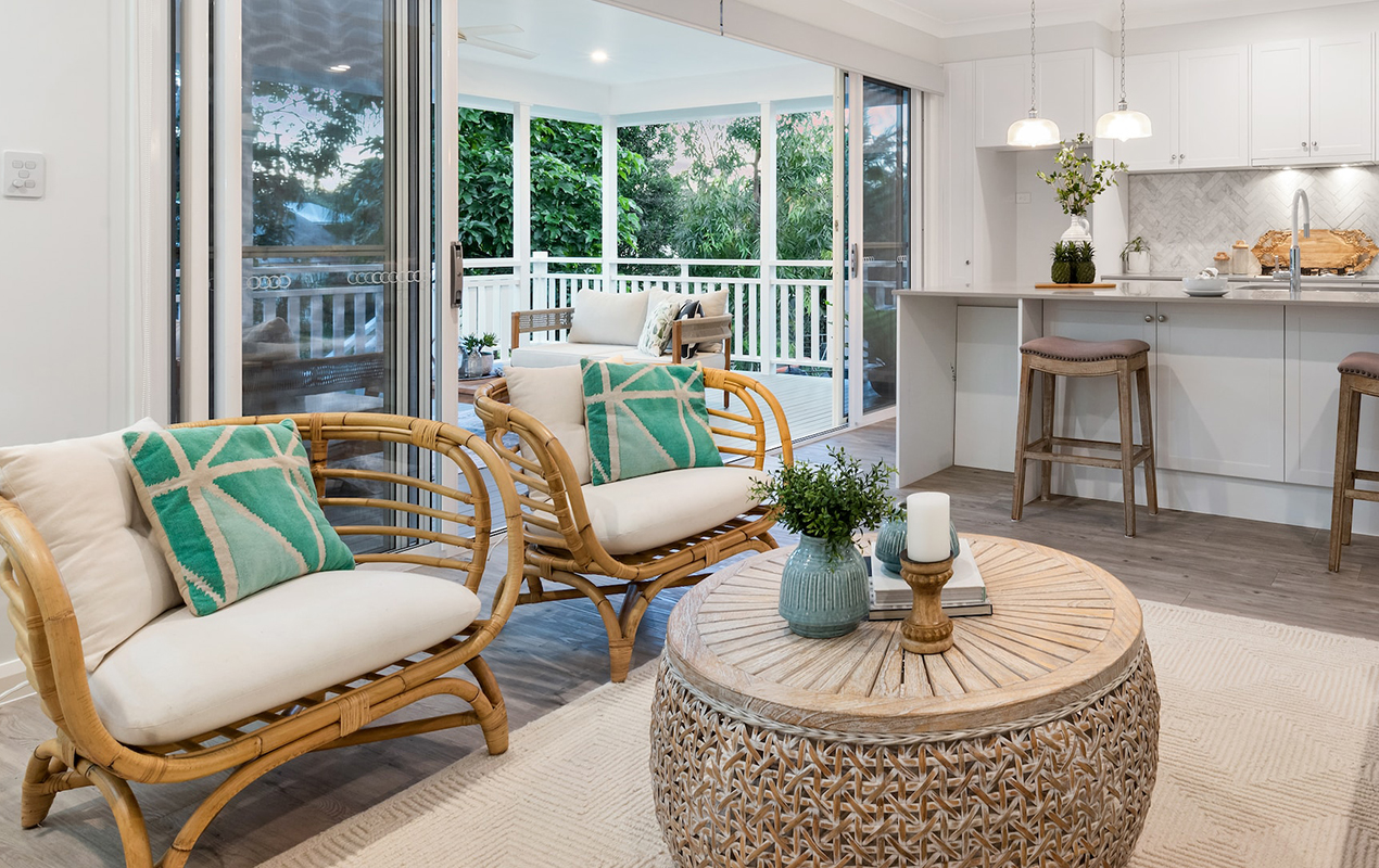 Open plan kitchen with rattan coffee table