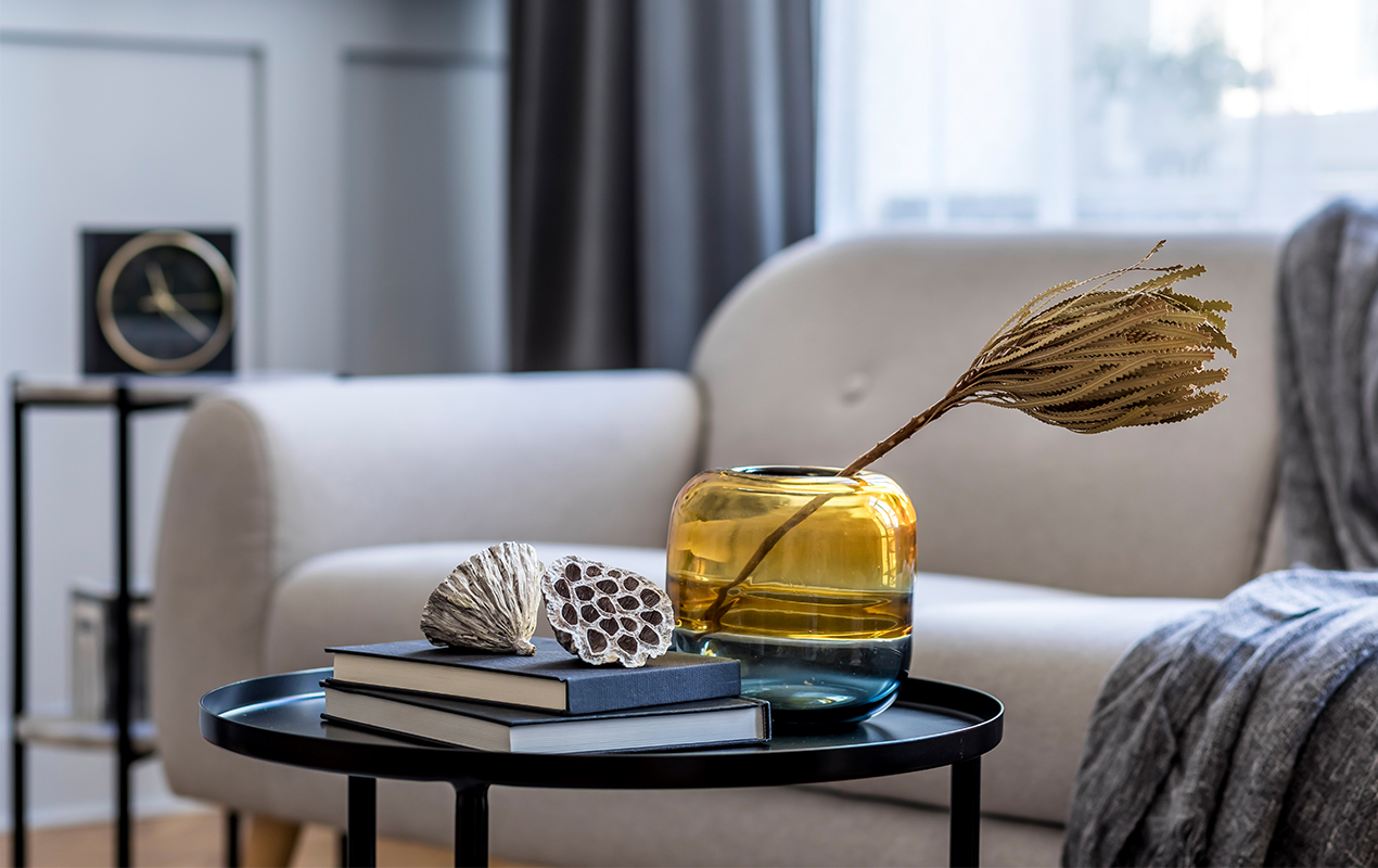 A Black Metal Coffee Table with Sea-Inspired Antique Decor