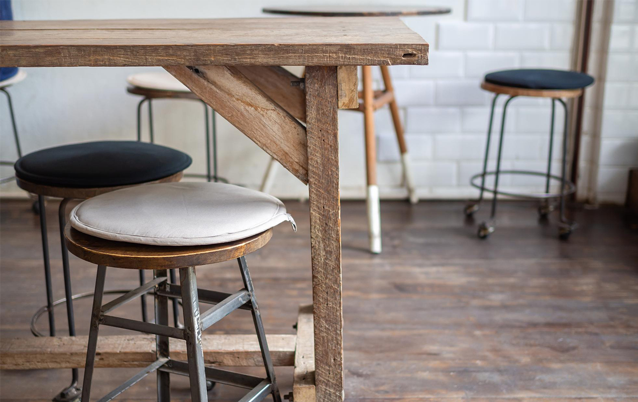 A Rustic Journey: The Wooden Coffee Table and Stool Set