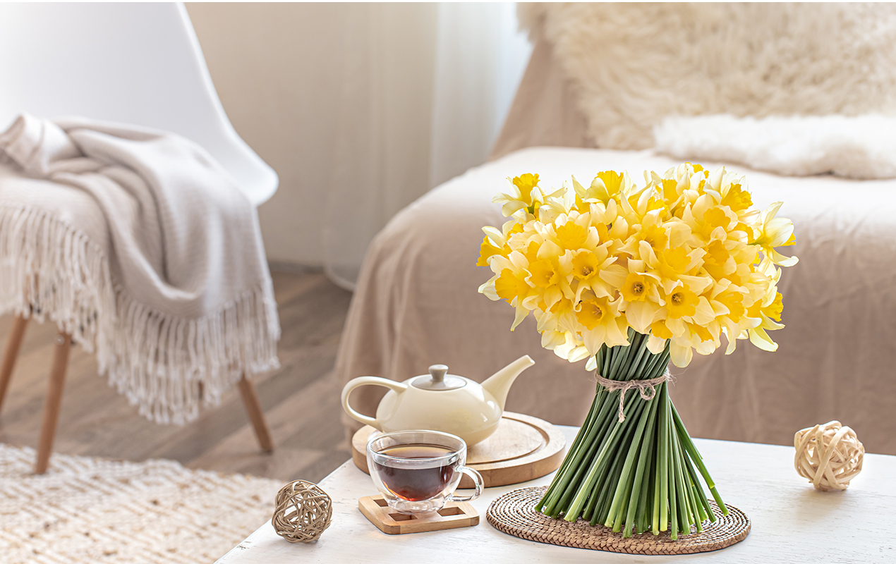 Neutral living room with tea set and round coffee table decor