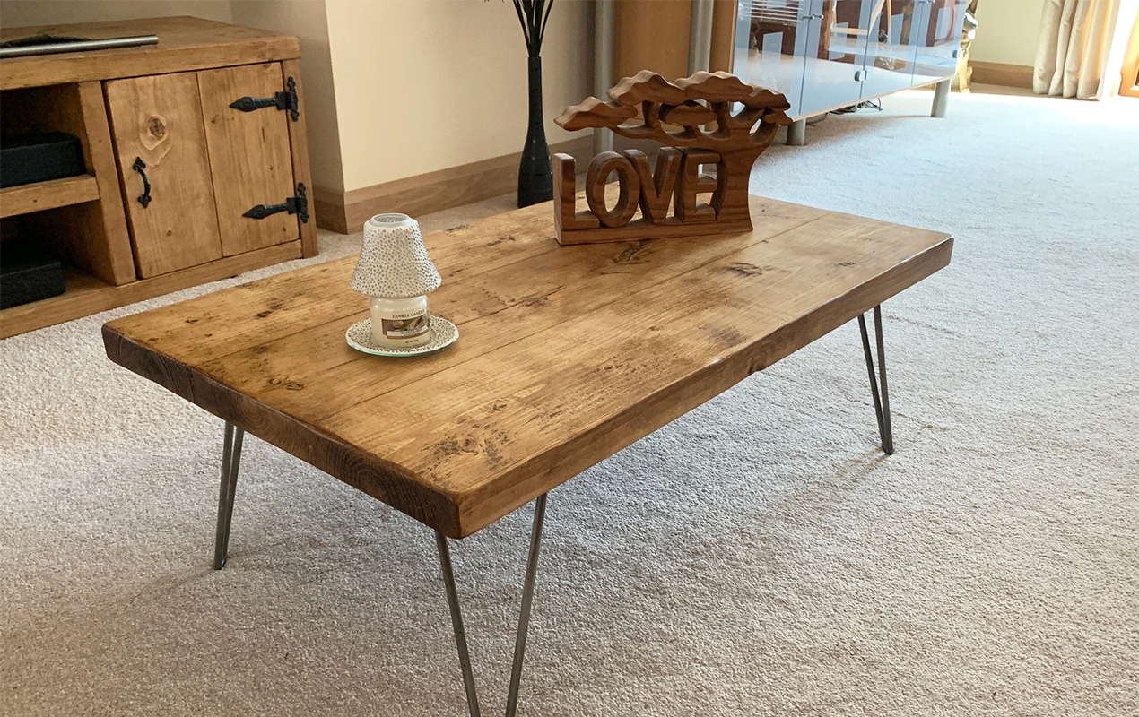 Living room internal with wood coffee table with industrial accents