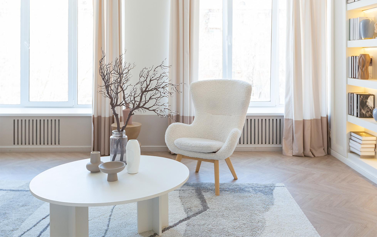 Slightly Oval Wooden White Coffee Table