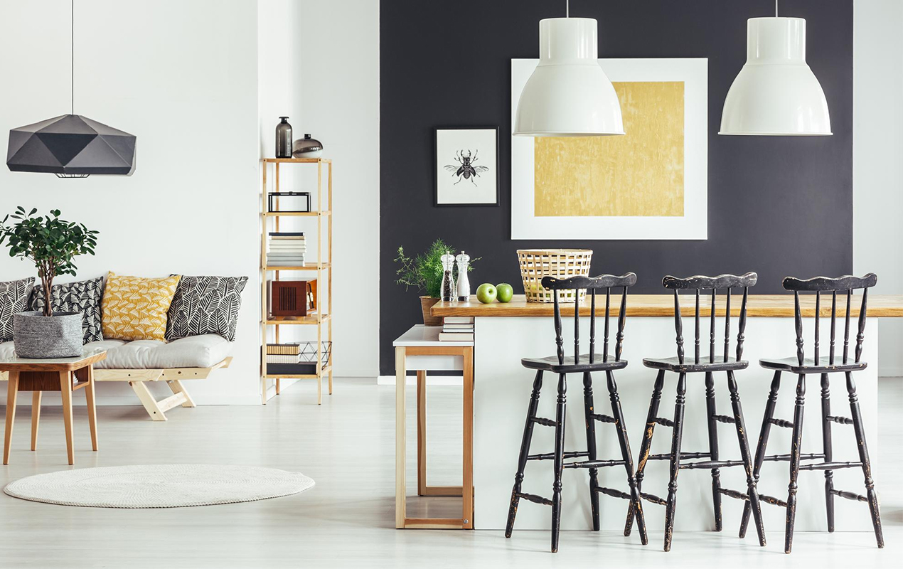 Stacks of Sophistication: Wood Coffee Table with White Sheet