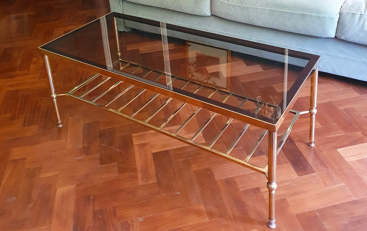 The Mid-20th Century Brass and Glass Coffee Table with Magazine Rack