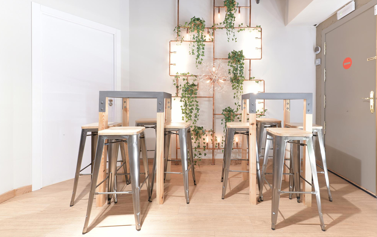 The Perfect Pairing: Glass-Top Square Coffee Table with Metallic Stools