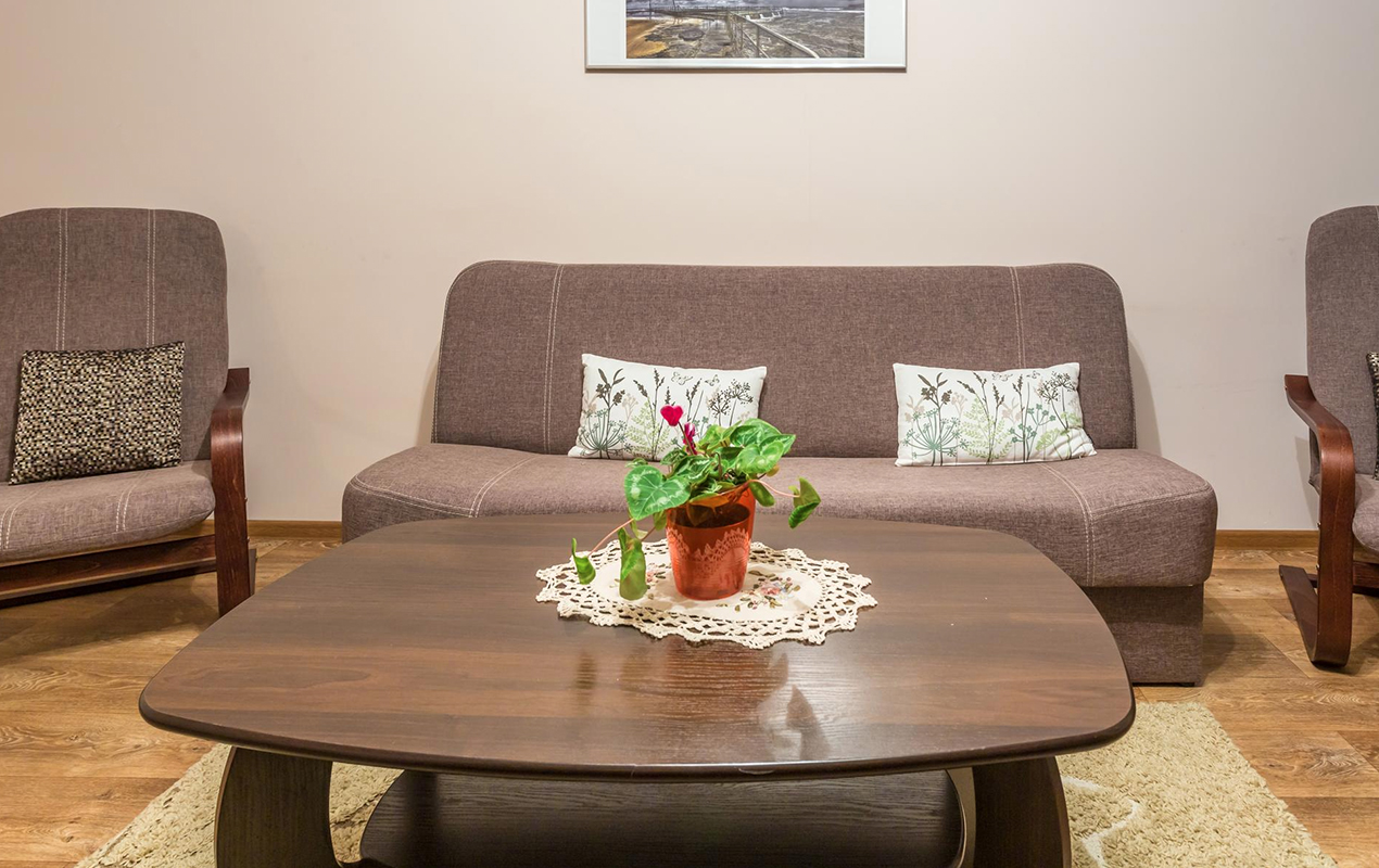 Upscale Appeal Glossy Walnut Table in a Relaxing Zone