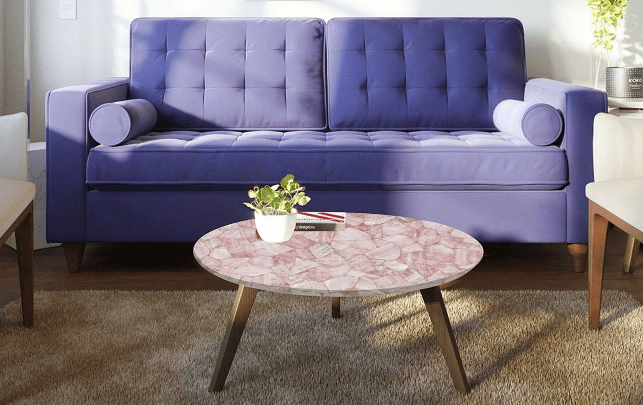 Charming Contrast: Pink Marble Coffee Table, Violet Sofa, and Natural Light in an Elegant Living Room