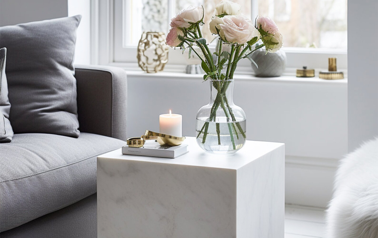 Modern Serenity: A Picture-Perfect Living Area with White Marble Coffee Tables and Subtle Accents