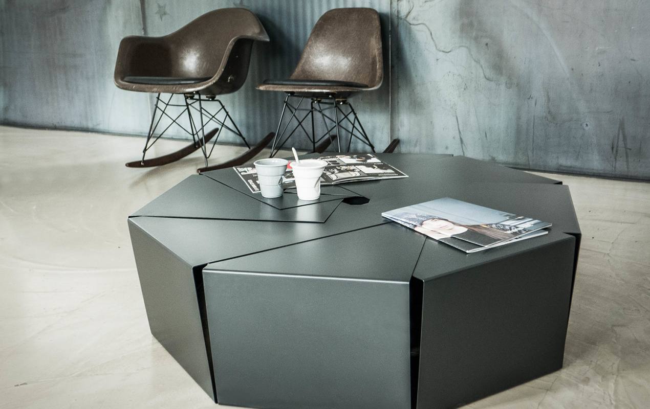 The black steel sheet Table: A Bold Blend of Form and Function