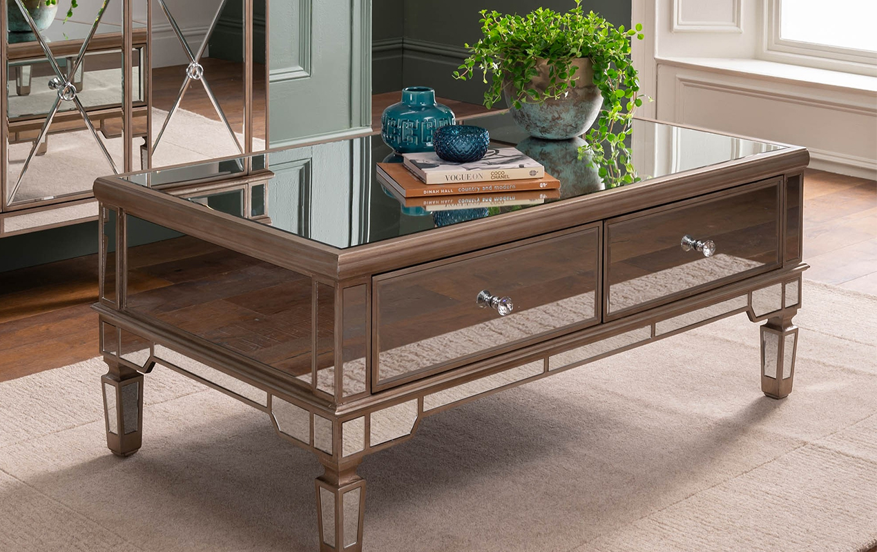 Living room with mirror coffee table and rustic accents