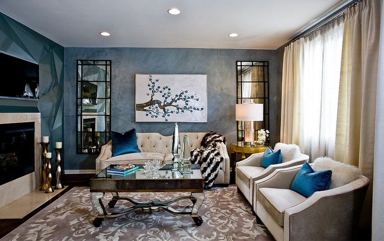 Living room with blue accents and mirror coffee table