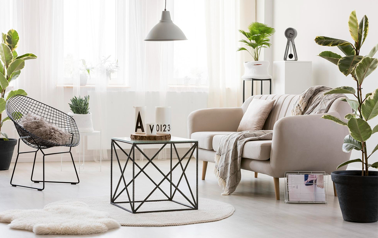 Minimalist Elegance Black Stainless Steel Square Coffee Table in a Contemporary Living Space