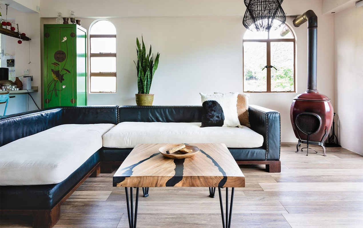 Modern Harmony Sleek Coffee Table and L-Shaped Sofa Set in Sunlit Ambiance