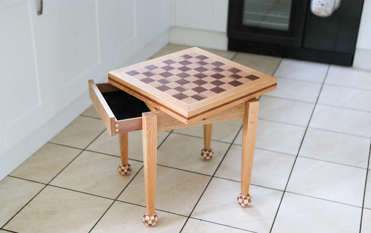 Small Wooden Chess Table with Rotating Top, Functional Drawer, and Foldable Design