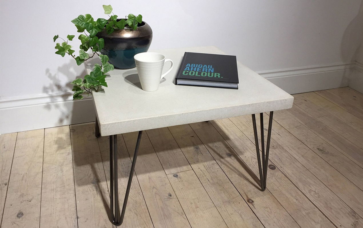 Square concrete coffee table with black hairpin legs