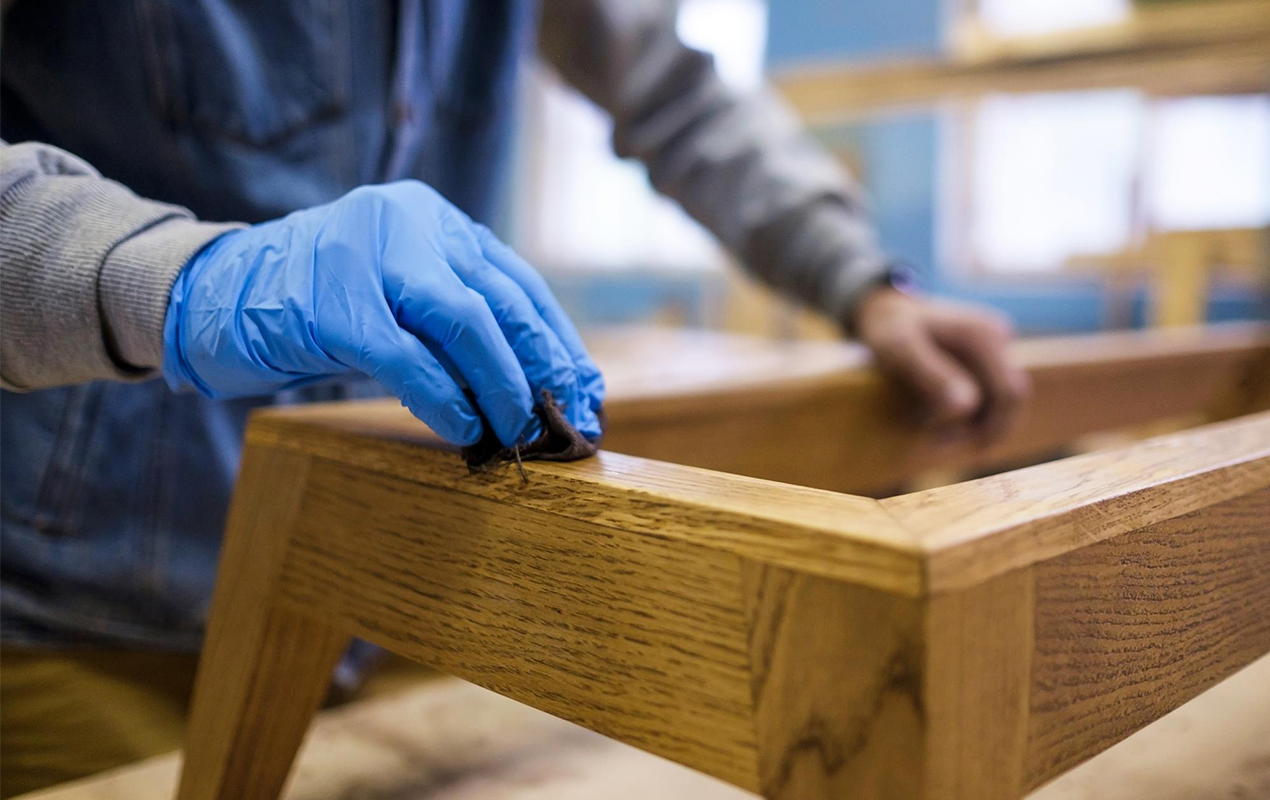 Wooden table with staining process