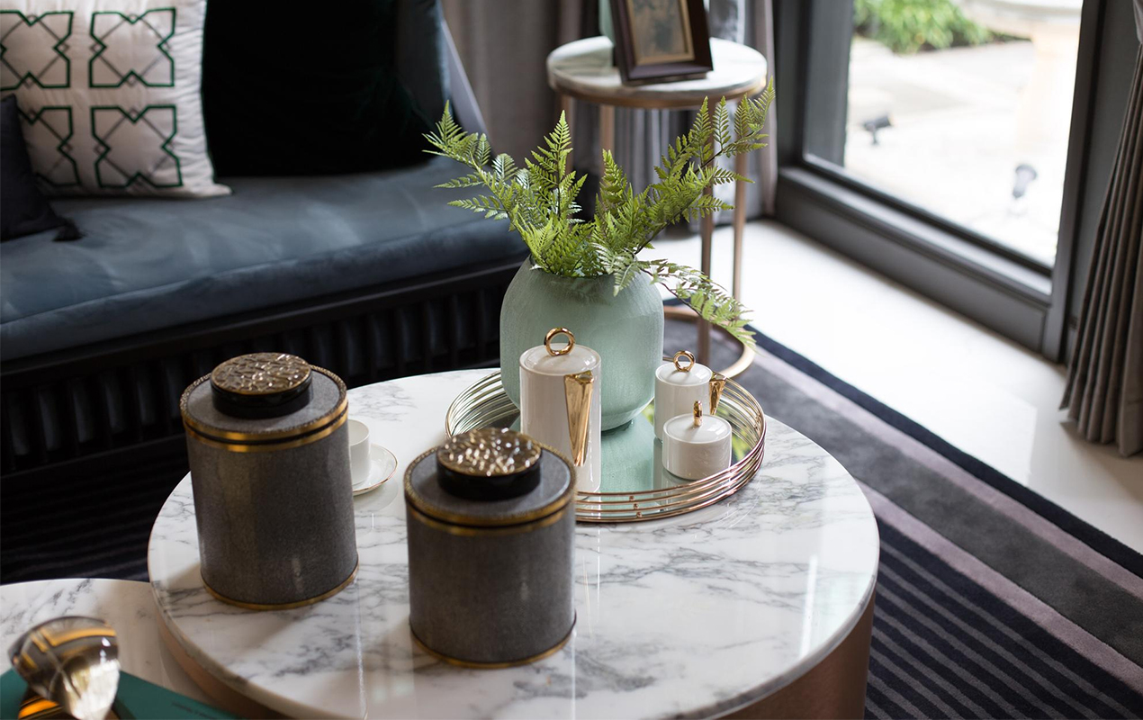 Living interior with table toped with tray and decor