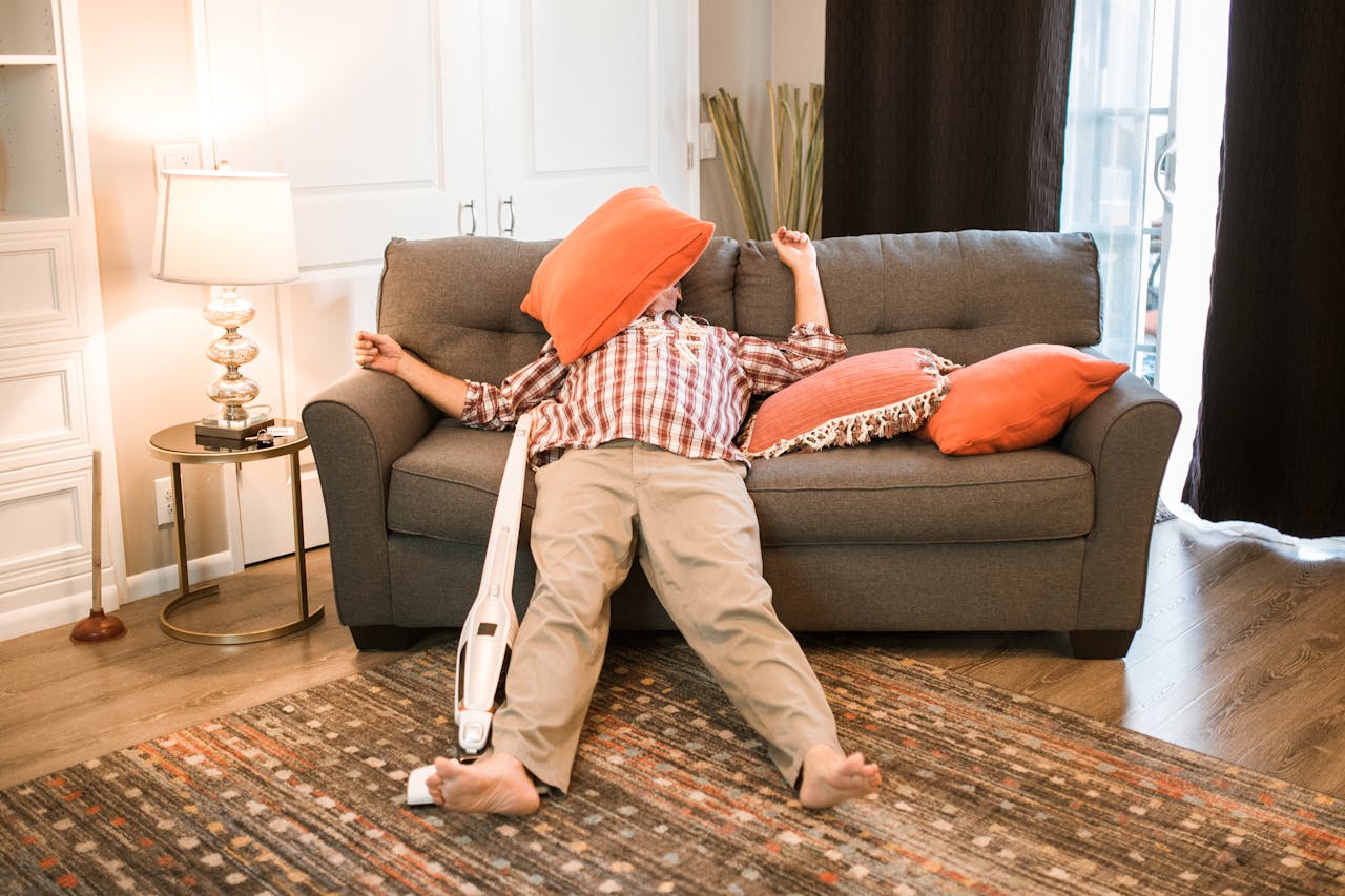 Living room interior with person on sofa
